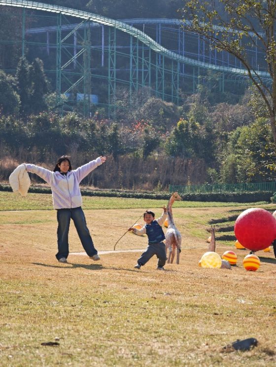 Host family and child in a park